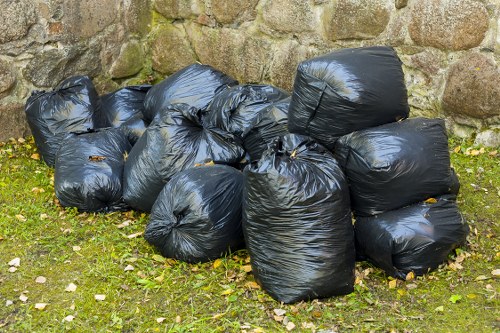 Erith construction workers complying with waste disposal regulations